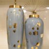 Elegant Sky Blue Ceramic Vases with Golden Accents